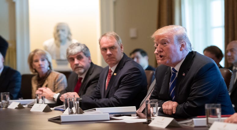 President Donald Trump speaks to the media during a cabinet meeting at the White House on November 20, 2017 in Washington, D.C. President Trump officially designated North Korea as a state sponsor of terrorism.
