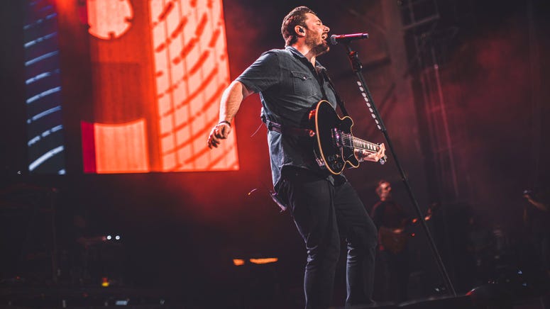 Chris Young on stage during the Raised on Country World Tour presented by USAA Chris Young on stage during the Raised on Country World Tour presented by USAA