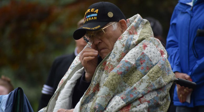 A Korean War veteran wipes a tear from his eye during the Memorial Day ceremony at Grandview Ceremony in Colorado. Memorial Day weekend across America.