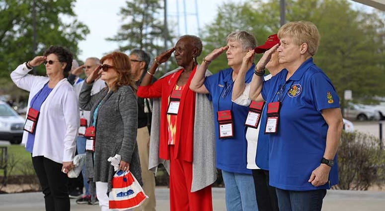 Vietnam Women Veterans salute during the retreat ceremony Apr. 26 at the U.S. Army Combined Arms Support Command 1st Logistical Command Memorial at Fort Lee, Virginia. The women were hosted by the U.S. Army Women's Museum for a conference the group holds