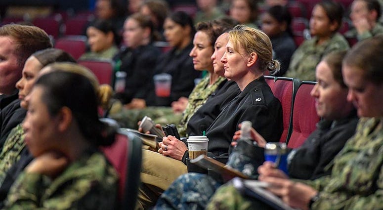SAN DIEGO (March 26, 2019) -- Sailors listen to a guest speaker at the annual Women's Waterfront Symposium on board Naval Base San Diego. The symposium featured Capt. Jen Ellinger, commanding officer of USS Lake Champlain (CG 57), as the keynote speaker a Commander, Naval Surface Force, U.S. Pacific Fleet