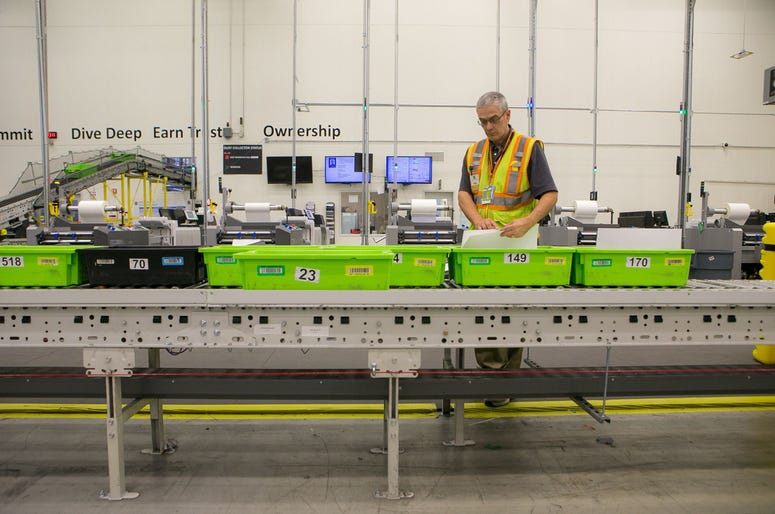 Made-on-demand and Books-on-Demand technology at the Amazon facility in Middletown. News Amazon Tour.