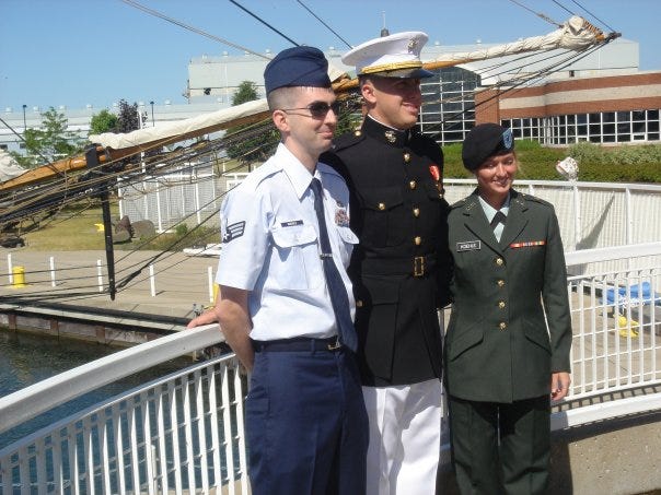 Andrew Koehle (left) with two of his cousins who served. Air Force veteran Andrew Koehle seen here with his cousins donated his organs after passing away at 36
