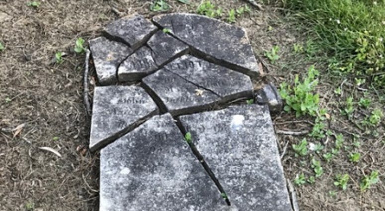 A shattered headstone at the neglected Mare Island Naval Cemetery in Vallejo, California.