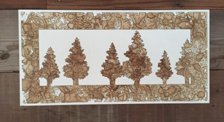 Art made entirely from spilled coffee.