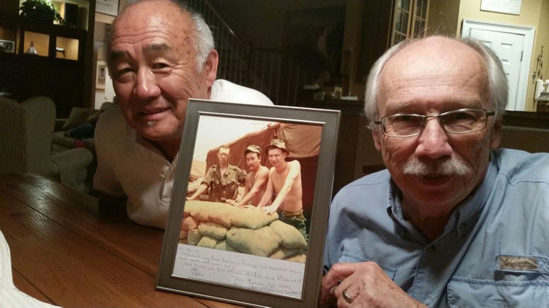 Rodney Fujita (l) father of former NFL star Scott Fujita, with stand-up comedian Pete Burdon (r) . The two served together with the Marine Corps in Vietnam and are at center and right in the inset picture taken in Vietnam