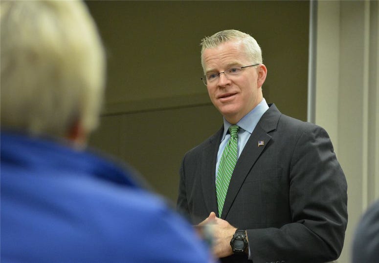 Sean Connolly speaks to residents of Somers, CT. during a recent campaign event
