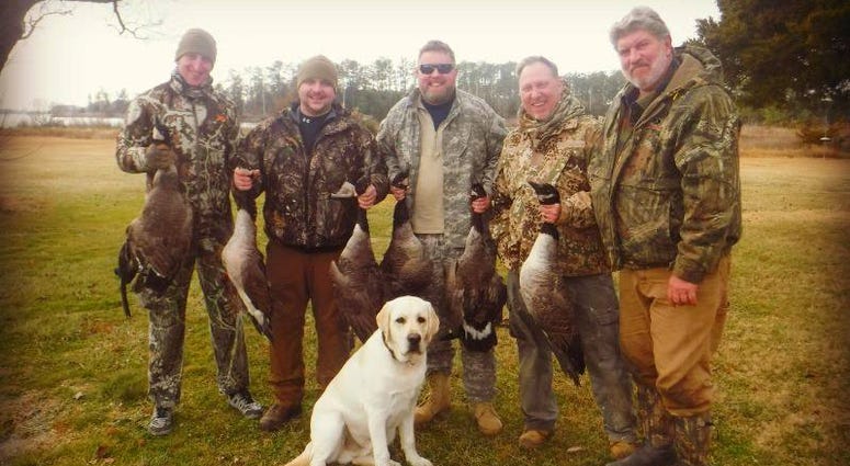 Ben Kiernan, Rob Jones, Eric Dehm and Phil Briggs pose after a successful hunt