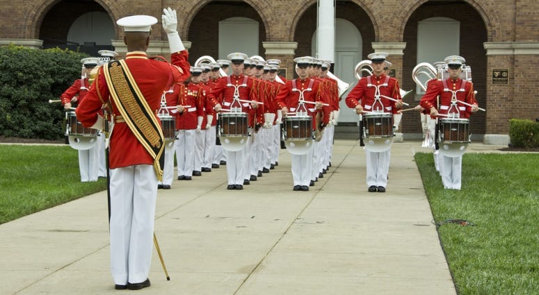 “The Commandant’s Own” U.S. Marine Drum & Bugle Corps (D&B), marches the D&B down center walk during a Beirut Memorial Parade at Marine Barracks Washington, Washington, D.C., Oct. 23, 2017. drummer