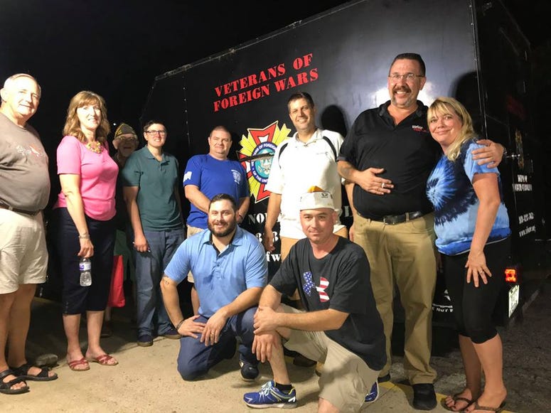 VFW Post 7383 members pose with the first trailer of goods loaded up to be sent into areas devastated by Hurricane Florence
