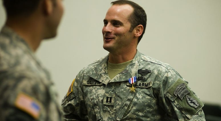 Capt. Matt Golestyn is presented with the Silver Star, which has since been rescinded