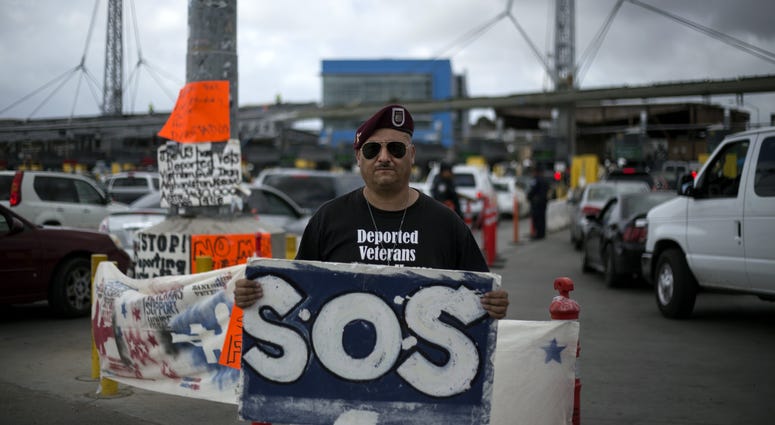 The deported veteran Hector Barajas Varela takes part during a demonstration in Tijuana Mexico in March 2014. Thursday he learned he will become a U.S. citizen.