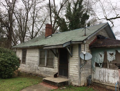 John Greene's house in complete disrepair before the renovations disrepair