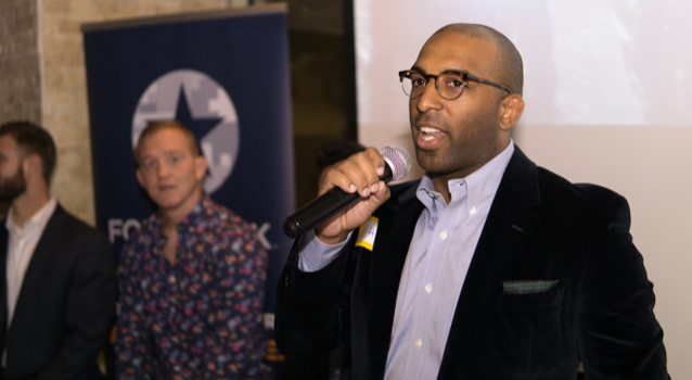 Marine Corps vet Harrison Floyd speaking at an event.