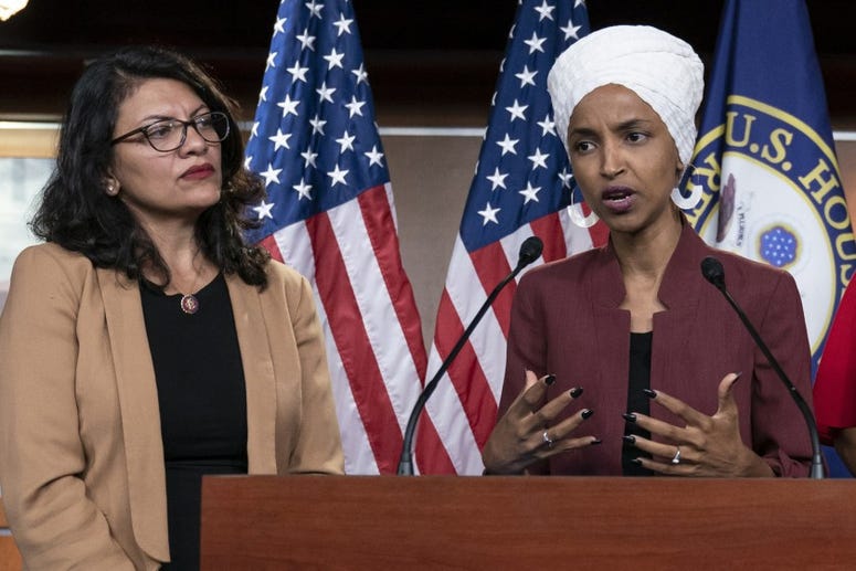 Rep Ilhan Omar speaks at a press conference with Rep Rashida Tlaib Rep Ilhan Omar speaks at a press conference with Rep Rashida Tlaib