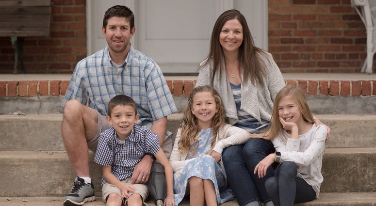 Retired Army Capt. Ryan Kules, his wife Nancy and their three children, Jillian, Liv and Evan. Kules