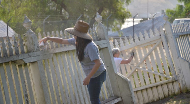 Volunteers participate in a National Day of Service on Sept. 11 2017 to clean up the Mare Island Naval Cemetery in Vallejo, Calif. painting
