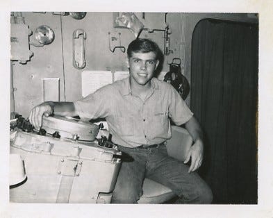 Raymond Pierson seen sitting at a radar scope inside the Combat Information Center aboard the USS Ponchatoula in 1968.