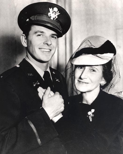 Ronald Reagan poses in uniform with his mother Nelle. Ronald Reagan in his Army uniform with his mother Nelle in the 1940s