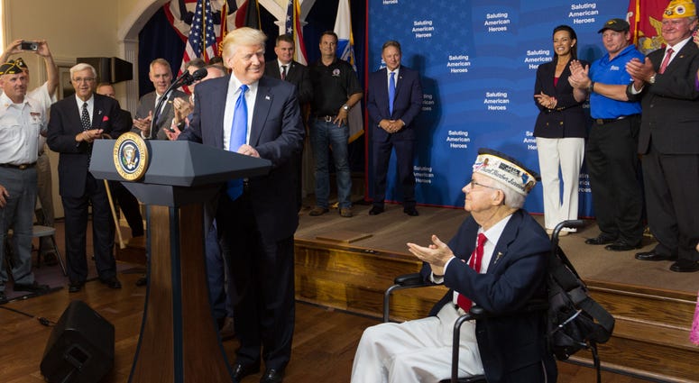 President Trump addresses AMVETS members during a visit to AMVETS Post 44 in Struthers, Ohio Amvets