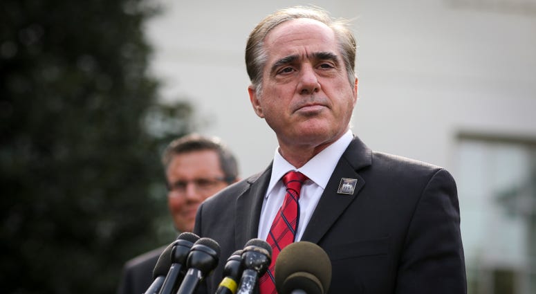 Veterans Affairs Secretary David Shulkin, pauses as he speaks with the media after he attended President Donald Trump signing the National Veterans and Military Families Month Proclamation, at the White House on November 1, 2017, in Washington, DC.