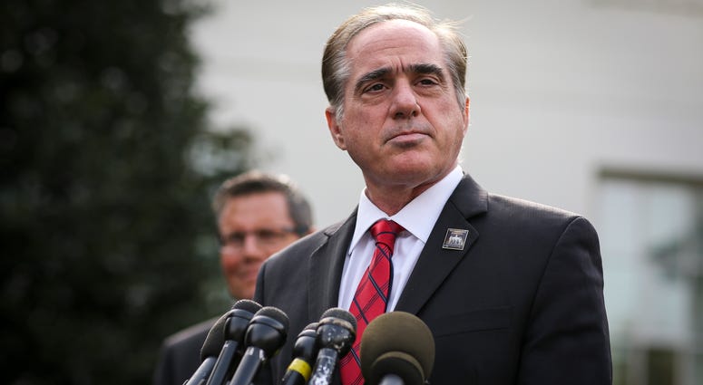 Veterans Affairs Secretary David Shulkin, pauses as he speaks with the media after he attended President Donald Trump signing the National Veterans and Military Families Month Proclamation.