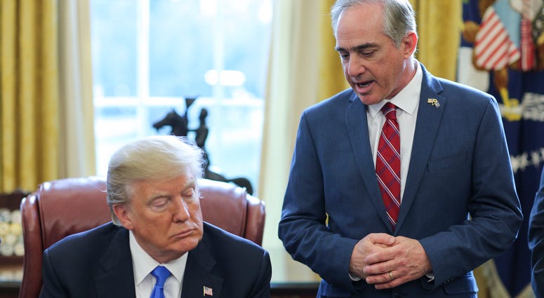 This photo was taken in happier days, just last year, when the President was sure he would never have to say "you're fired" to Shulkin.