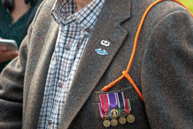 Gene Metcalfe, a World War II veteran and former POW, wears his Orange Lanyard after being awarded the Military Order of William, in Groesbeek, the Netherlands Gene Metcalfe, a World War II veteran and former POW, wears his Orange Lanyard after being awarded the Military Order of William, in Groesbeek, the Netherlands