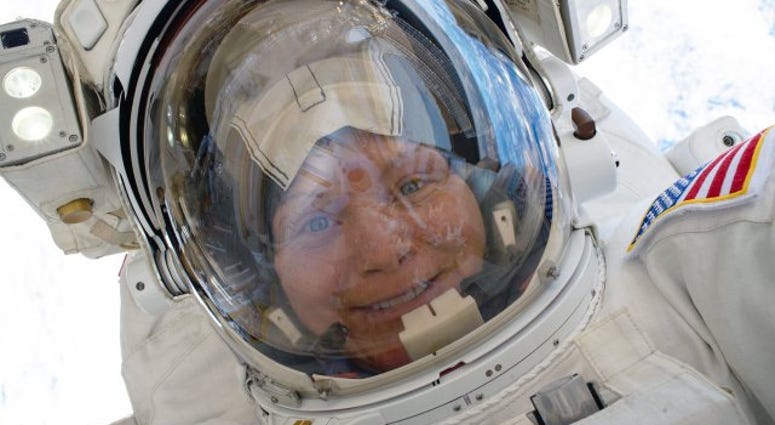 Astronaut Lt. Col. Anne McClain takes a selfie during a 6.5-hour spacewalk Army astronaut reflects on mission 250 miles above Earth