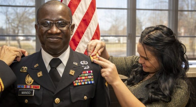 Maj. Tatchie Manso has the rank of Major pinned on him Maj. Tatchie Manso has the rank of Major pinned on him