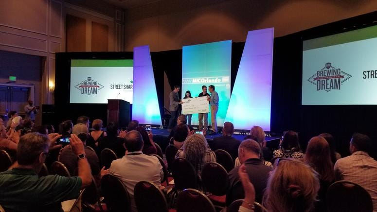 Navy vet Mark Mhley is awarded $15,000 for his company "Re4ormed Organics" from Mark Rockefeller and Sam Adams founder Jim Koch