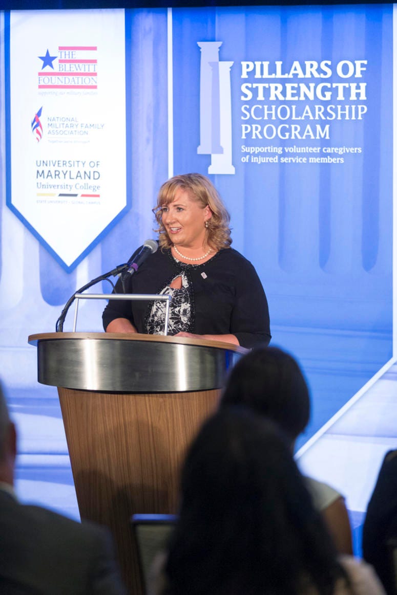Justina Knopfler, a recipient of a Pillars of Strength scholarship, addresses the audience at the awardee reception.