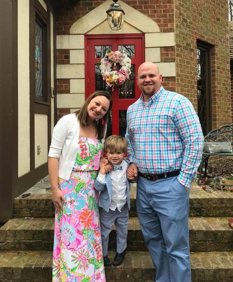 Lanna (L) and Tim Britt (R) pose with their daughter. Tim is a 100 percent disabled Army veteran.