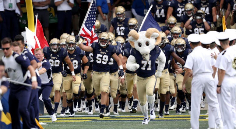 Navy football team takes the field Navy football team takes the field