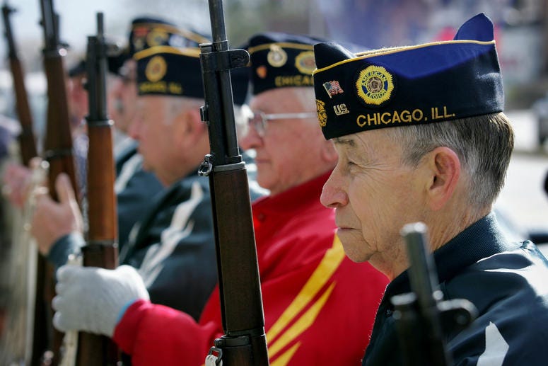 Members of the American Legion Post 220 prepare for a rifle salute during a Veterans Days ceremony November 11, 2004 in Chicago, Illinois. About 30 people gathered for the small ceremony on the eastern edge of the city. Members of the American Legion Post 220 prepare for a rifle salute during a Veterans Days ceremony November 11, 2004 in Chicago, Illinois. About 30 people gathered for the small ceremony on the eastern edge of the city.