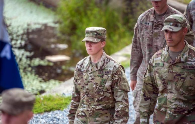 Staff Sgt. Amanda F. Kelley marches in formation during her Ranger School graduation at Fort Benning, Ga., Aug. 31, 2018. AmandaKelley