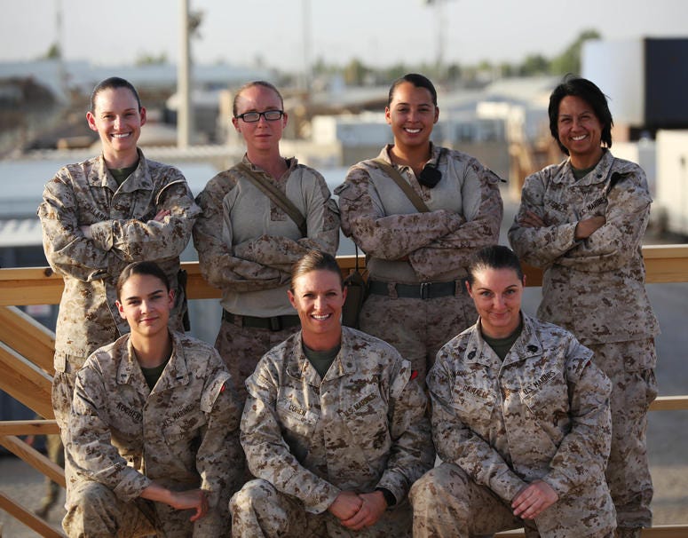 "I'm proud to be a part of the legacy and honored to hold the title 'Marine'," said 1st Lt. Katie Kochert, a Marine with Task Force Southwest. This week marked the 100th anniversary of women in the Marine Corps. Pictured are seven of the eight female Mari