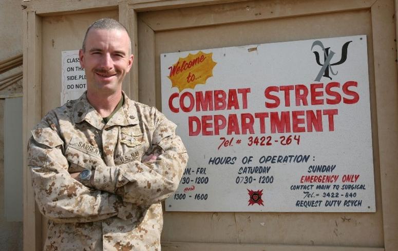 Lt. Cmdr. Paul D. Sargent, psychiatrist with the Combat Stress Department at Camp Al Taqaddum, Iraq, stands in front of his office, Oct. 26. Sargent recently implemented the Combat Sleep Course to help service members and civilians. Psychiatrist