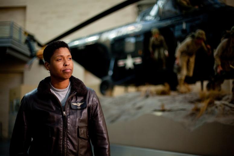Capt. Vernice Armour stands in front of an exhibit at the National Museum of the Marine Corps