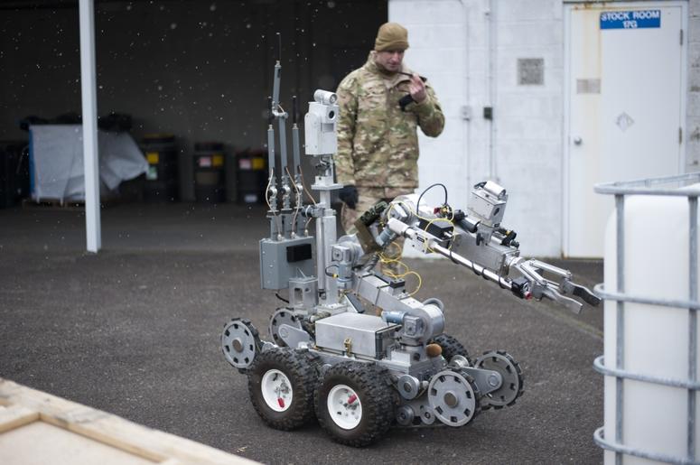 Master Sgt. Eric Hubbard, 142nd Civil Engineer Squadron, Explosive Ordnance Disposal Team Leader, monitors a robot designed to detect and disarm explosive implements during training, March 6, 2019, Portland Air National Guard Base, Ore. Air Force EOD Robot training at Portland Air National Guard Base