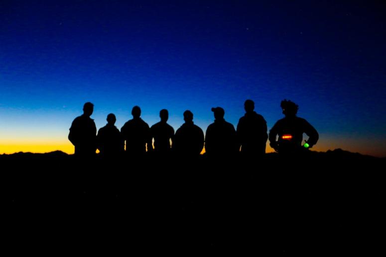 YUMA PROVING GROUNDS, Arizona- A U.S. Army Special Forces Team with 1st Special Forces Group (Airborne) stand for a photo after a night High Altitude High Opening jump January 25th, during a training exercise at the U.S. Army Yuma Training Grounds.