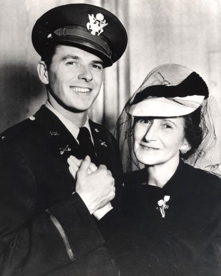Ronald Reagan poses in uniform with his mother Nelle. Ronald Reagan in his Army uniform with his mother Nelle in the 1940s