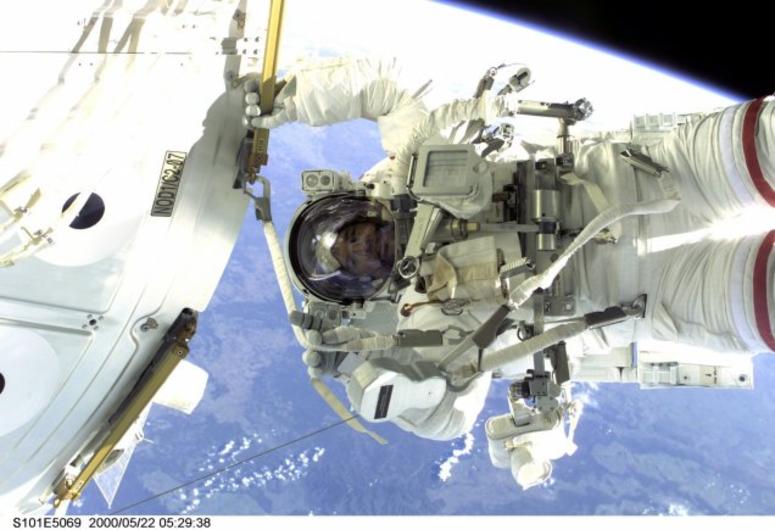 Jeff Williams takes part in a spacewalk during STS-101