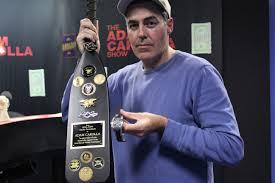 Adam Carolla with a Navy Paddle created by Kyle Nyseth
