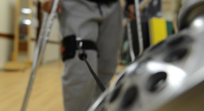 Staff Sgt. Constance Vaughn, 773rd Civil Engineer Squadron Operations Management, uses a sling to work out her acute knee injury in a controlled and healthy manner at the physical therapy clinic on Joint Base Elmendorf-Richardson, Alaska, Oct. 14, 2015. PhysicalTherapy