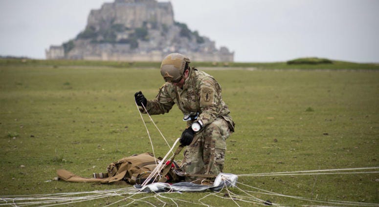 U.S Army Special Forces commemorate WWII with jump into Mont Saint-Michel, Normandy, France. U.S Army Special Forces commemorate WWII with jump into Mont Saint-Michel, Normandy, France.