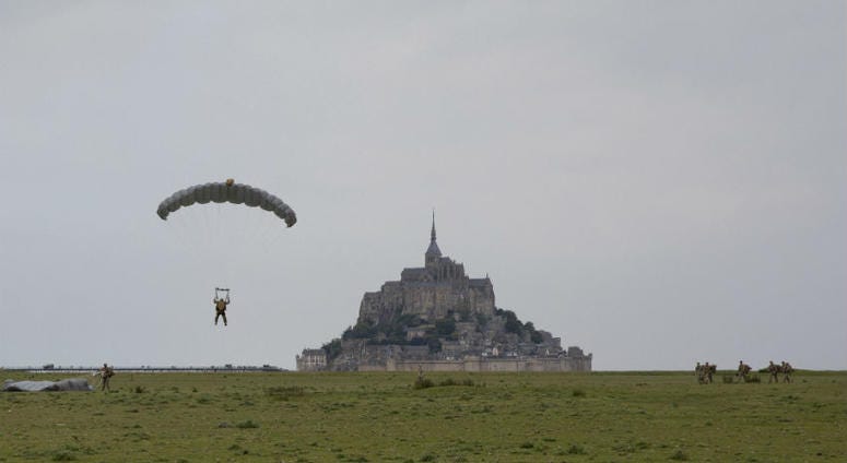 U.S Army Special Forces commemorate WWII with jump into Mont Saint-Michel, Normandy, France. U.S Army Special Forces commemorate WWII with jump into Mont Saint-Michel, Normandy, France.