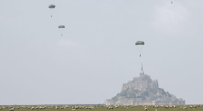 U.S Army Special Forces commemorate WWII with jump into Mont Saint-Michel, Normandy, France. U.S Army Special Forces commemorate WWII with jump into Mont Saint-Michel, Normandy, France.