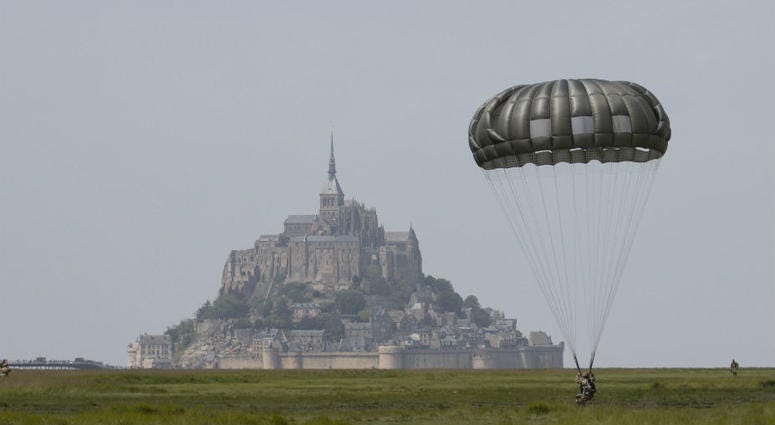 U.S Army Special Forces commemorate WWII with jump into Mont Saint-Michel, Normandy, France. U.S Army Special Forces commemorate WWII with jump into Mont Saint-Michel, Normandy, France.