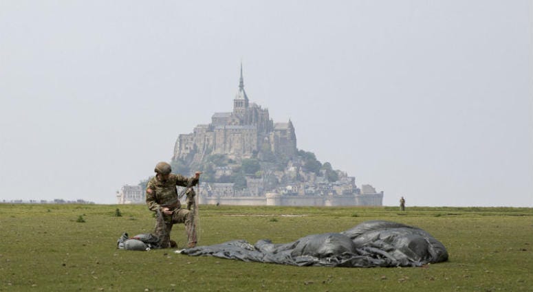 U.S Army Special Forces commemorate WWII with jump into Mont Saint-Michel, Normandy, France. U.S Army Special Forces commemorate WWII with jump into Mont Saint-Michel, Normandy, France.